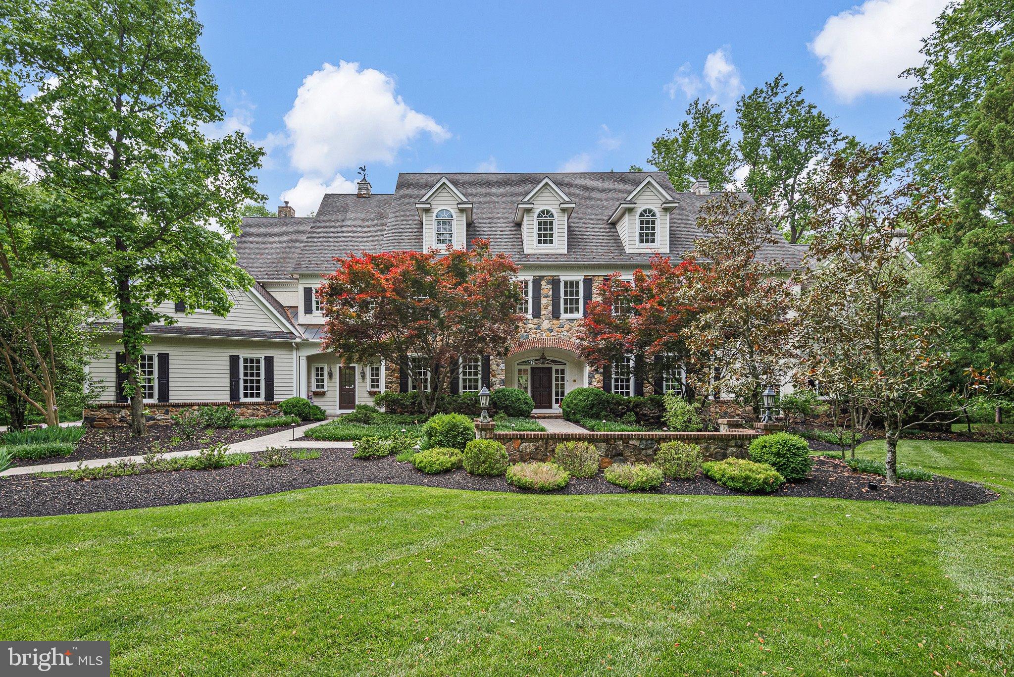 104 Timber Ridge Lane Chadds Ford, PA 19317 - Photo 2 of 65 a front view of a house with a garden