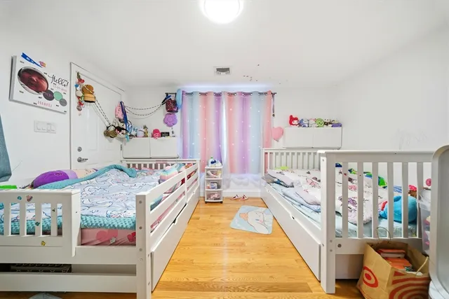 a bed room with a bed and a couch