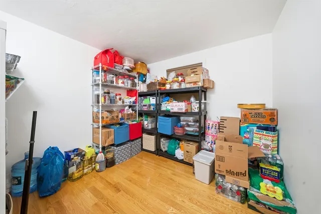 a room with toys and wooden floor