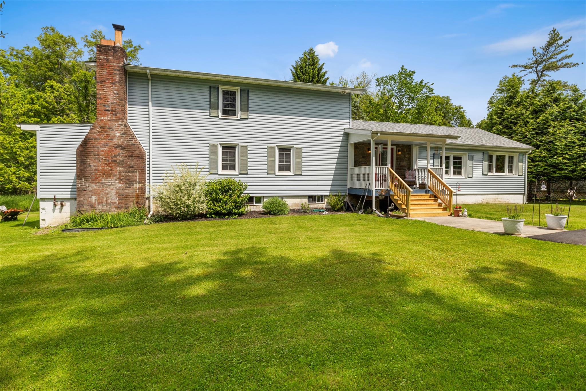 a front view of a house with patio
