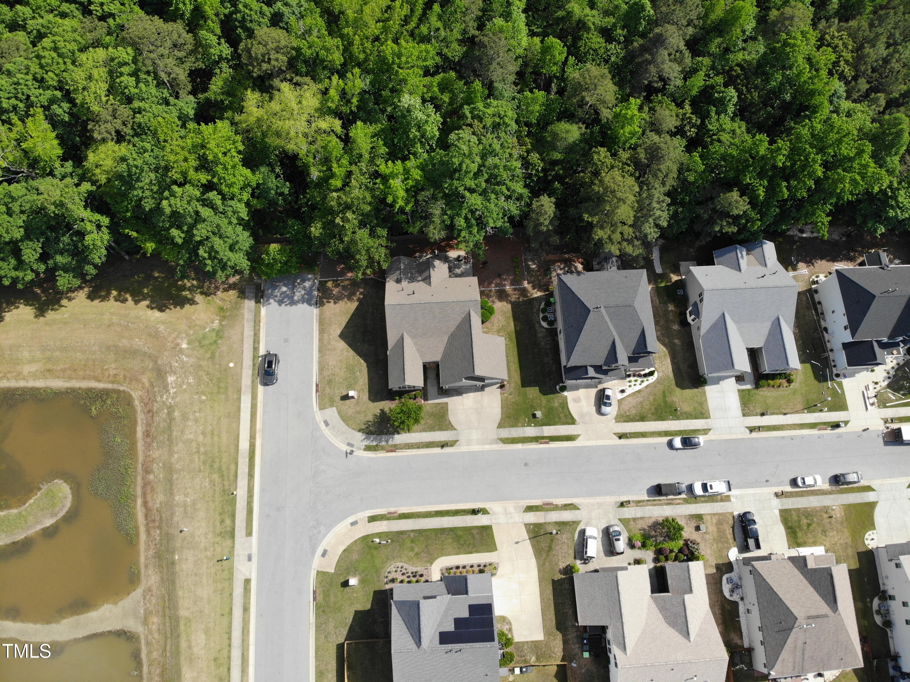7660 Channery Way Raleigh, NC 27616 - Photo 34 of 42 an aerial view of residential houses with outdoor space