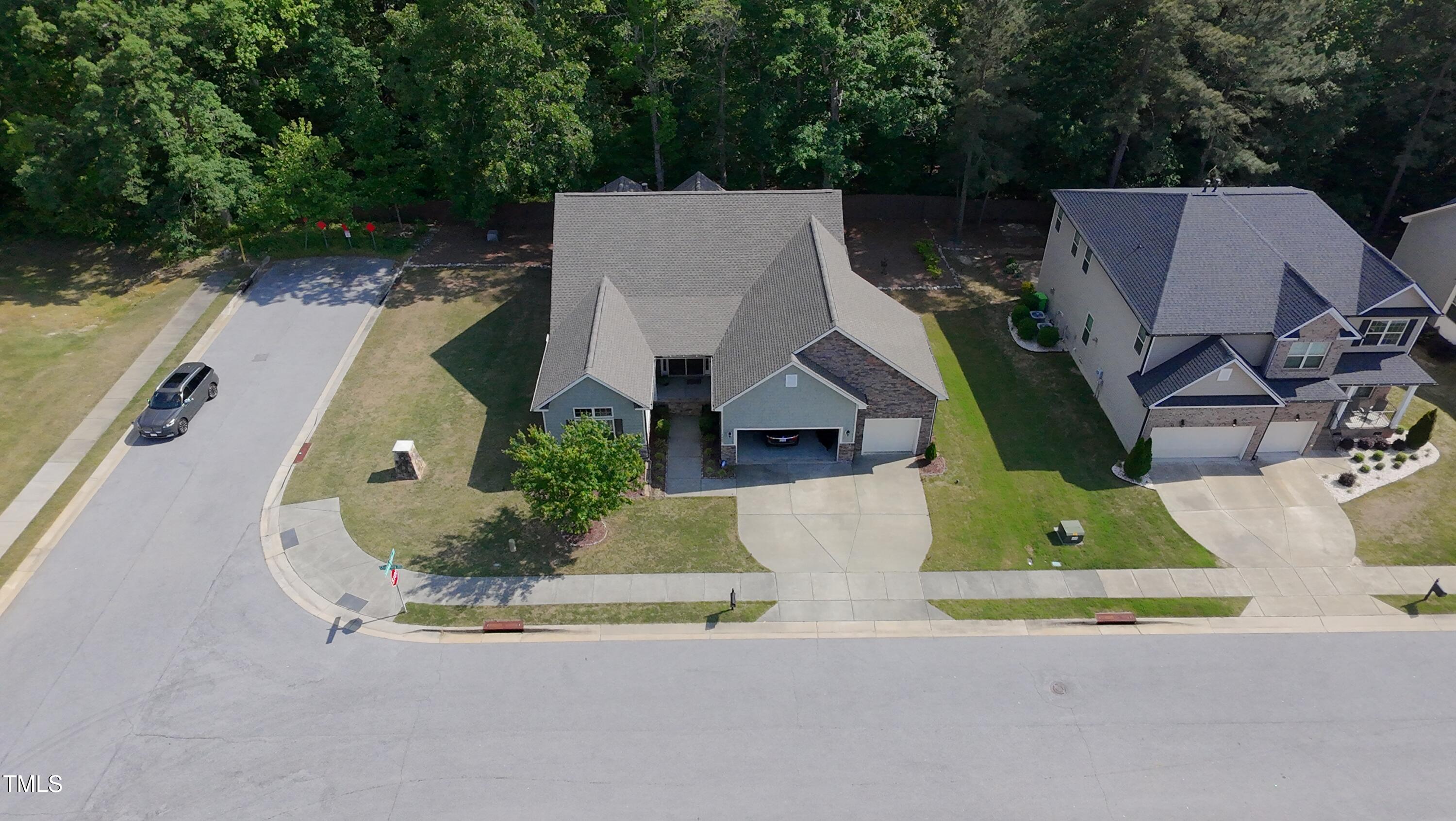 7660 Channery Way Raleigh, NC 27616 - Photo 35 of 42 an aerial view of a house with outdoor space and pool