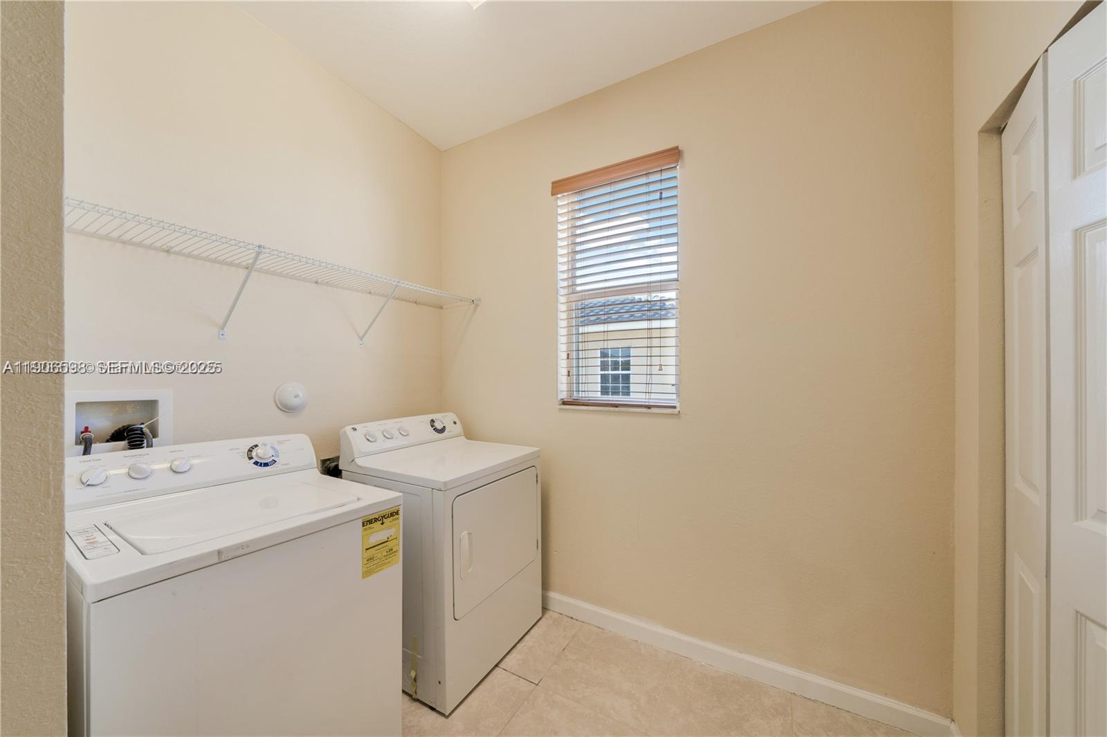 16946 Southwest 90th Terrace Circle Miami, FL 33196 - Photo 26 of 36 Spacious laundry room with closet