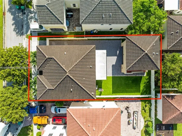 an aerial view of a house with a garden