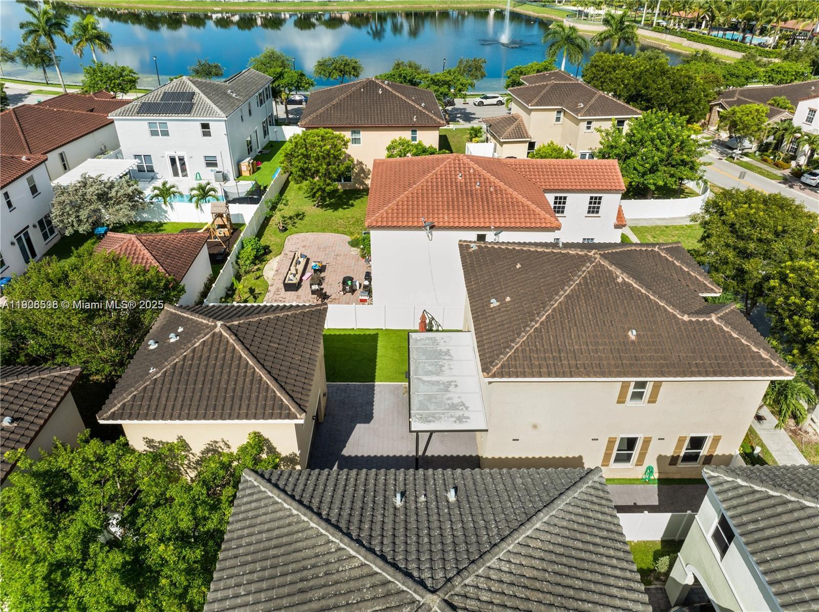 16946 Southwest 90th Terrace Circle Miami, FL 33196 - Photo 33 of 36 an aerial view of a house with a garden
