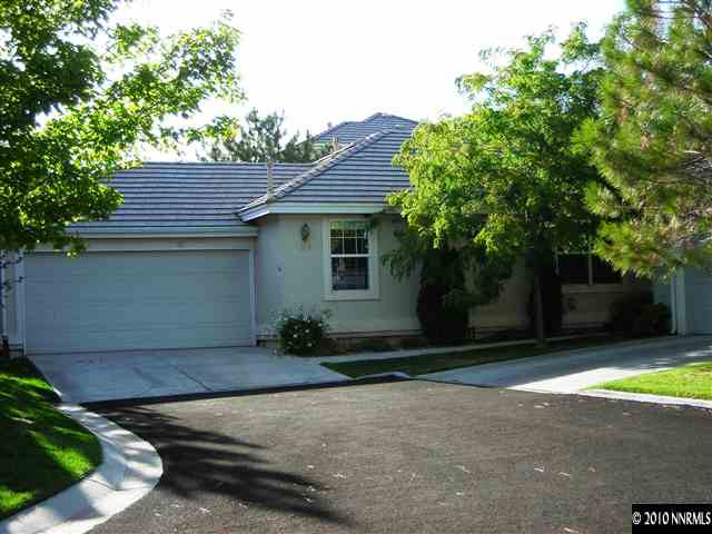1279 Tule Drive Reno, NV 89521 - Photo 1 of 13 a view of a house with backyard and garden