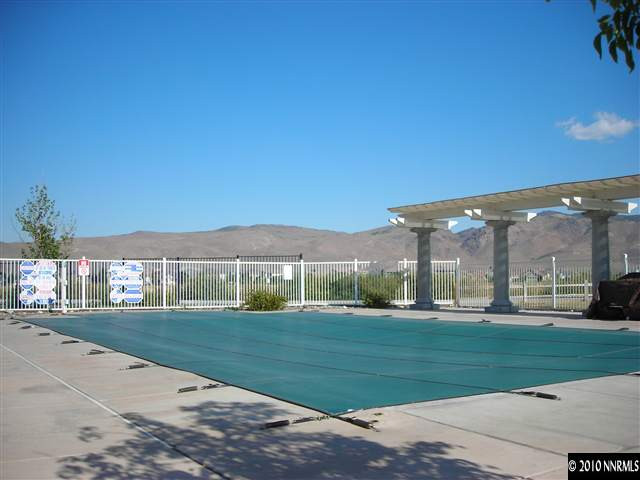 1279 Tule Drive Reno, NV 89521 - Photo 11 of 13 a view of a house with a big yard