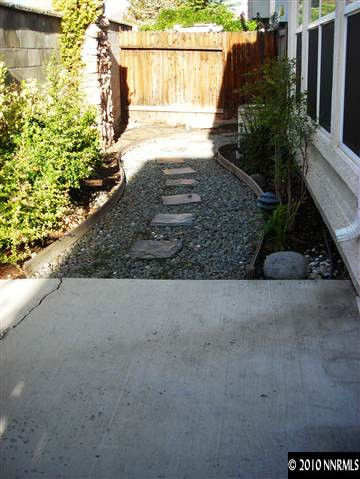 1279 Tule Drive Reno, NV 89521 - Photo 8 of 13 a view of a back yard of the house