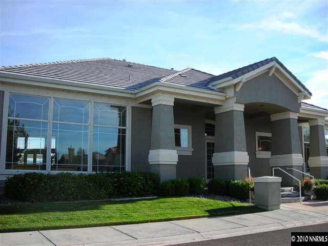 1279 Tule Drive Reno, NV 89521 - Photo 9 of 13 a front view of a house with garden