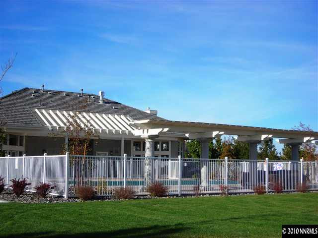 1279 Tule Drive Reno, NV 89521 - Photo 10 of 13 a front view of house with a garden
