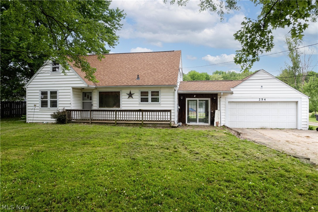 254 Johnson Road Wadsworth, OH 44281 - Photo 1 of 35 Capecod home with a garage, a front yard, and a deck