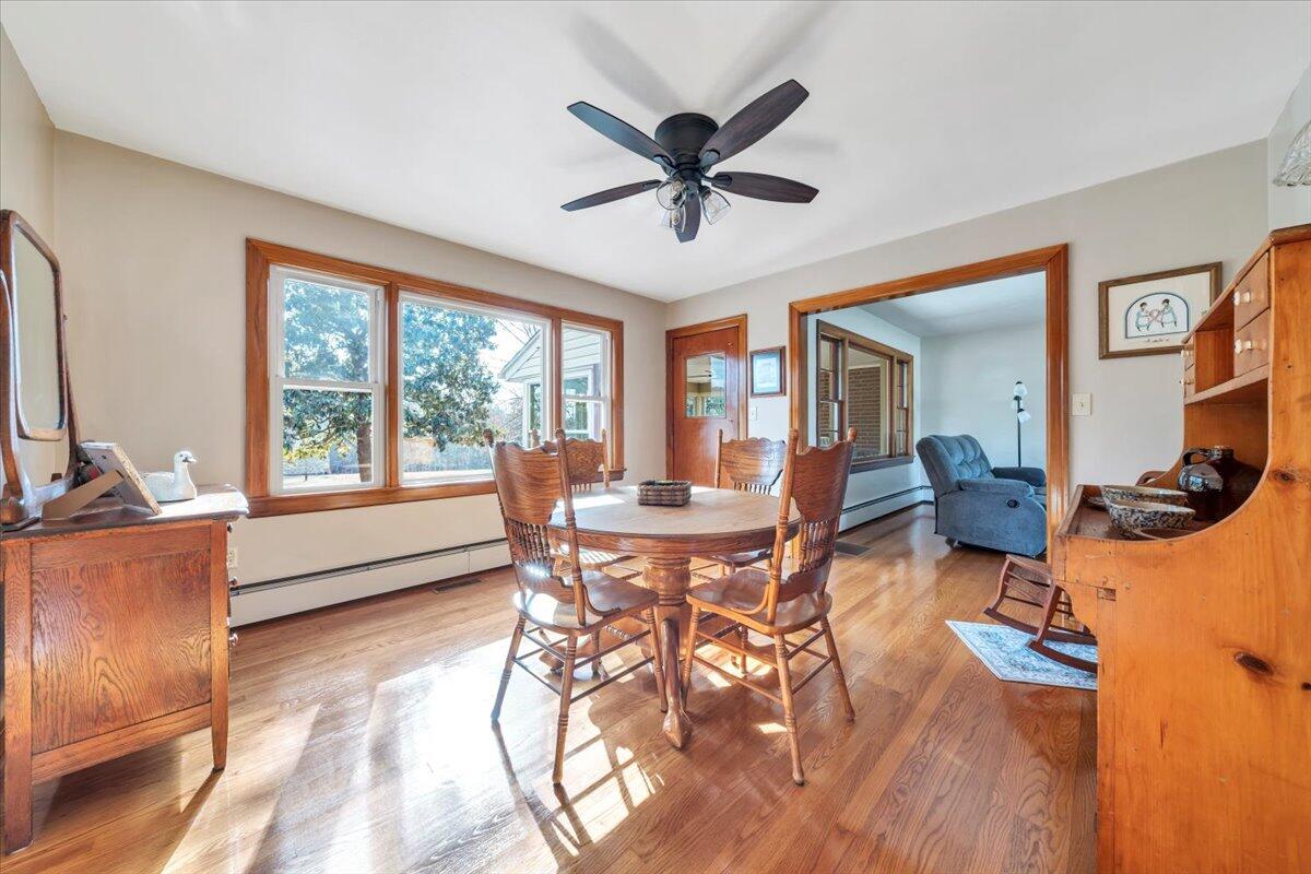 517 Boxley Road Roanoke, VA 24019 - Photo 12 of 76 a view of a dining room with furniture window and wooden floor