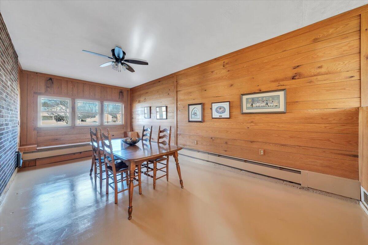 517 Boxley Road Roanoke, VA 24019 - Photo 19 of 76 a view of a dining room with furniture window and wooden floor