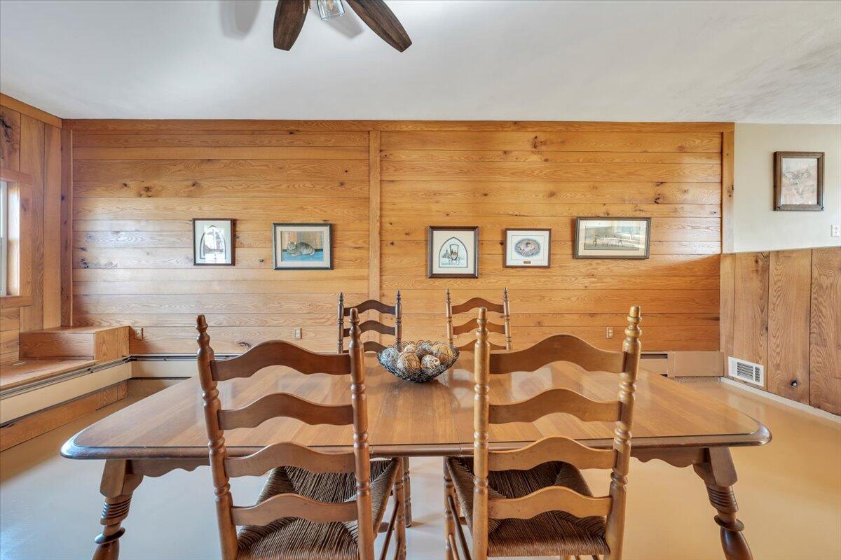 517 Boxley Road Roanoke, VA 24019 - Photo 23 of 76 a view of a dining room with furniture and wooden floor