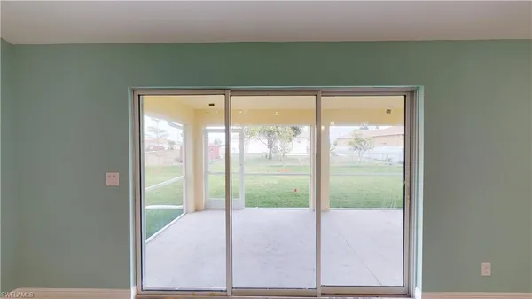 a view of an empty room and window