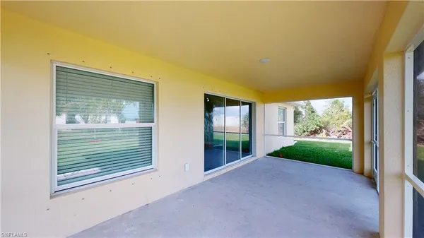 a view of a room that has a window