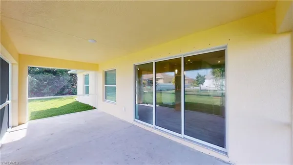 a view of outdoor space and backyard