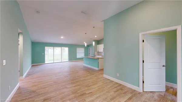 a view of an empty room and window