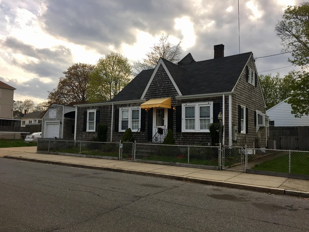 279 Mott Street Fall River, MA 02721 - Photo 1 of 19 a front view of house with yard