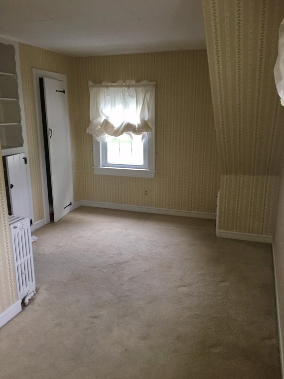 279 Mott Street Fall River, MA 02721 - Photo 16 of 19 an empty room with windows