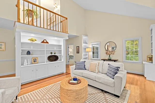 a living room with furniture and a table