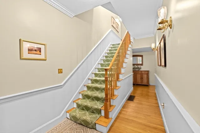 a view of a hallway with stairs