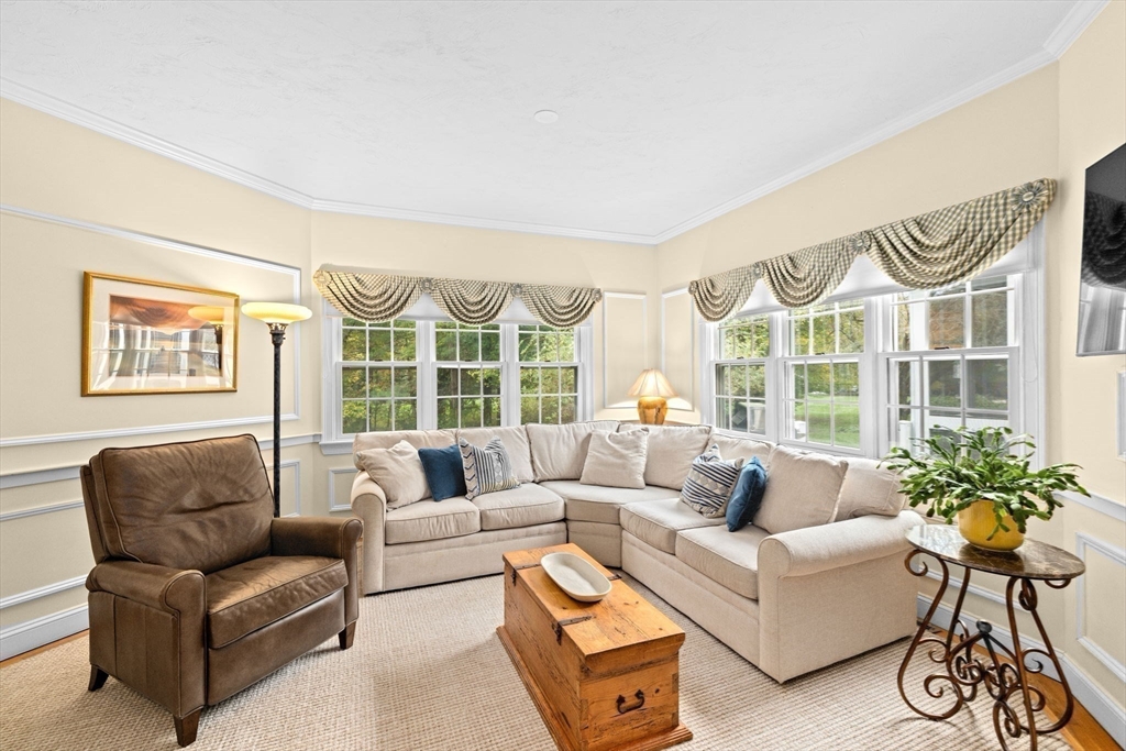 9 Forest Scituate Ma, Unit 9 Scituate, MA 02066 - Photo 5 of 41 a living room with furniture and a large window