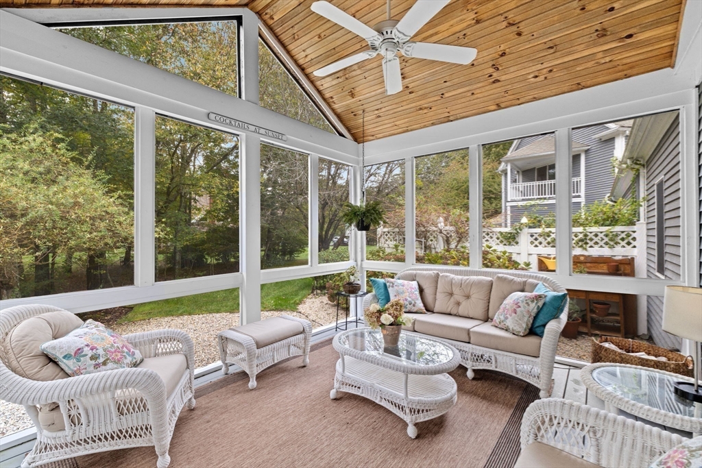 9 Forest Scituate Ma, Unit 9 Scituate, MA 02066 - Photo 8 of 41 a living room with furniture and floor to ceiling windows