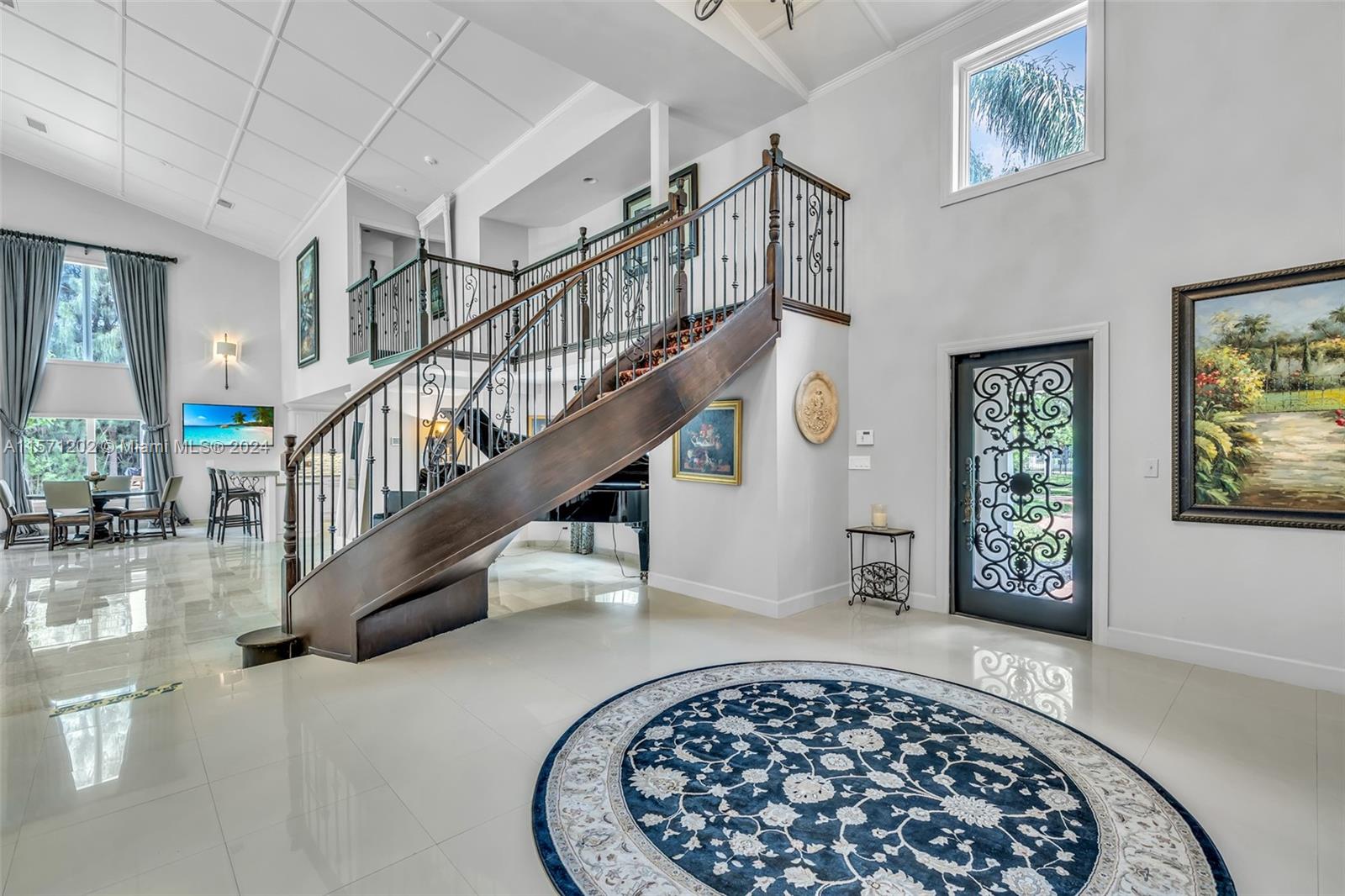 14600 Marvin Lane Southwest Ranches, FL 33330 - Photo 16 of 72 a view of entryway and hall with wooden floor