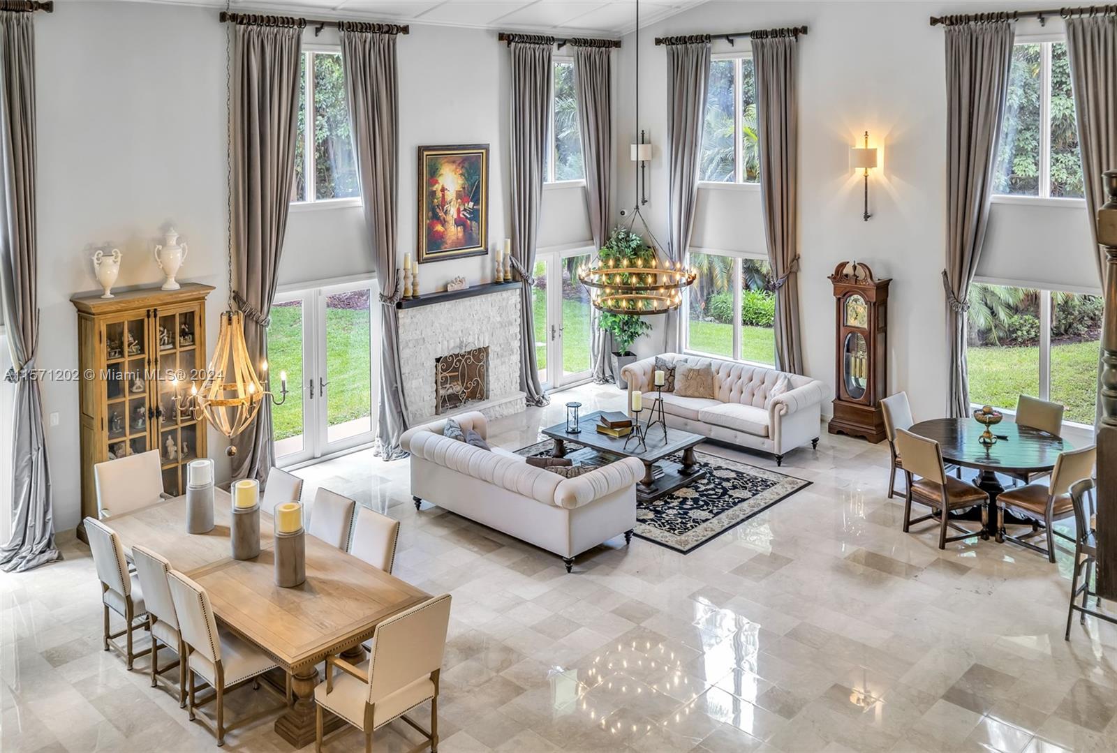 14600 Marvin Lane Southwest Ranches, FL 33330 - Photo 22 of 72 a living room with furniture and a large window