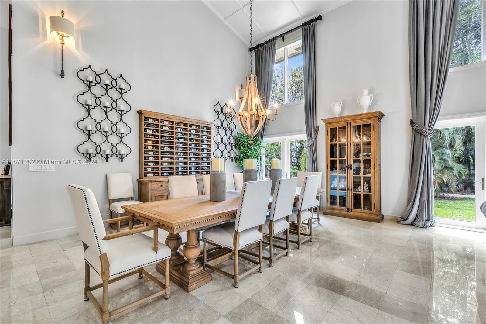 14600 Marvin Lane Southwest Ranches, FL 33330 - Photo 23 of 72 a view of a dining room with furniture and a potted plant
