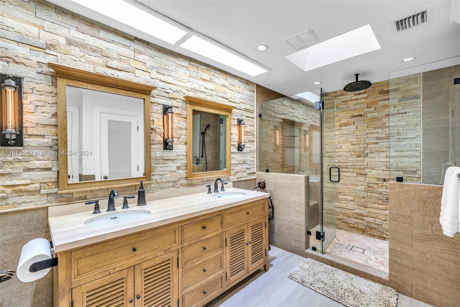 14600 Marvin Lane Southwest Ranches, FL 33330 - Photo 32 of 72 a bathroom with a double vanity sink mirror and double