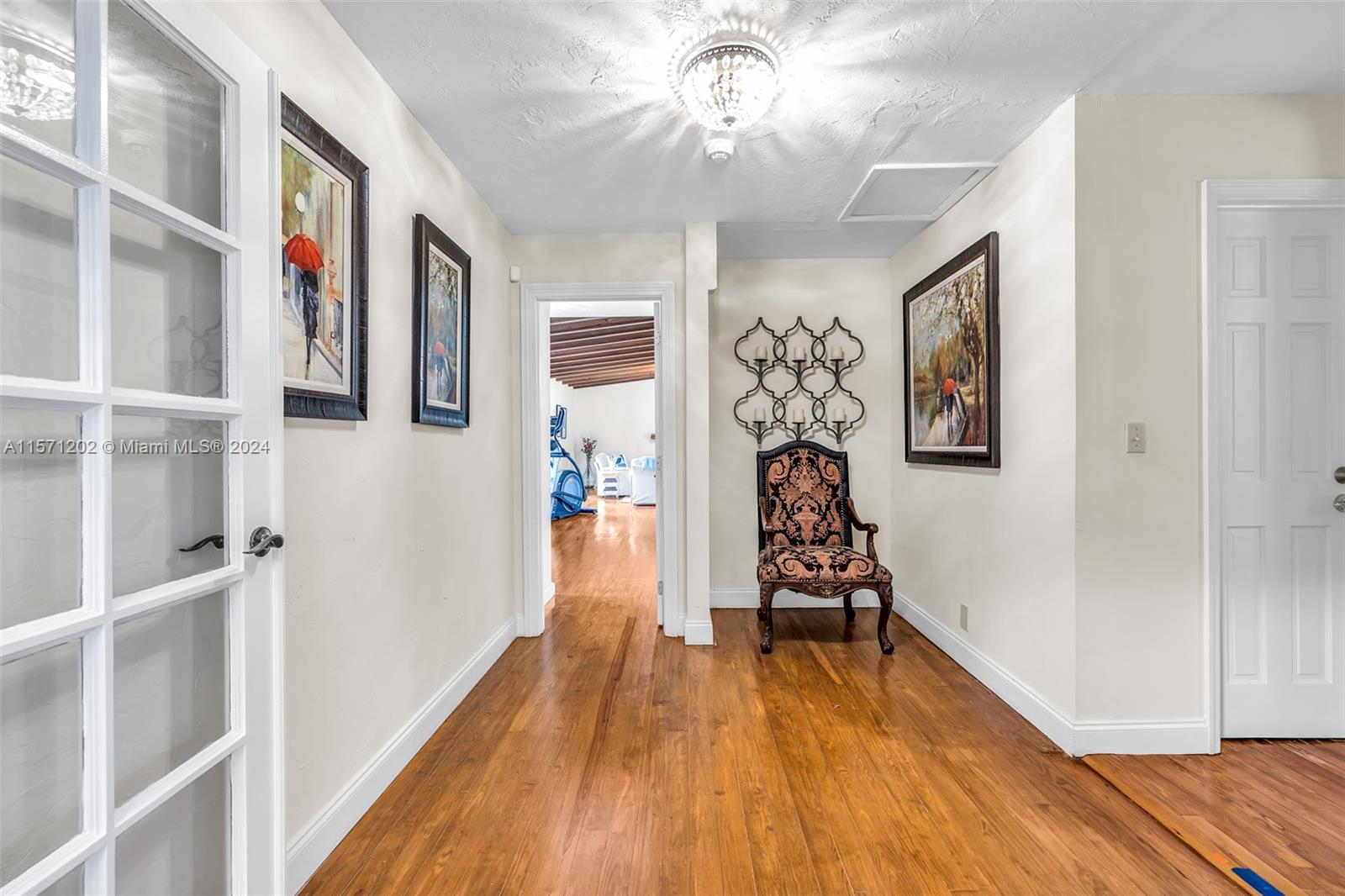14600 Marvin Lane Southwest Ranches, FL 33330 - Photo 36 of 72 a view of a room with wooden floor and workspace