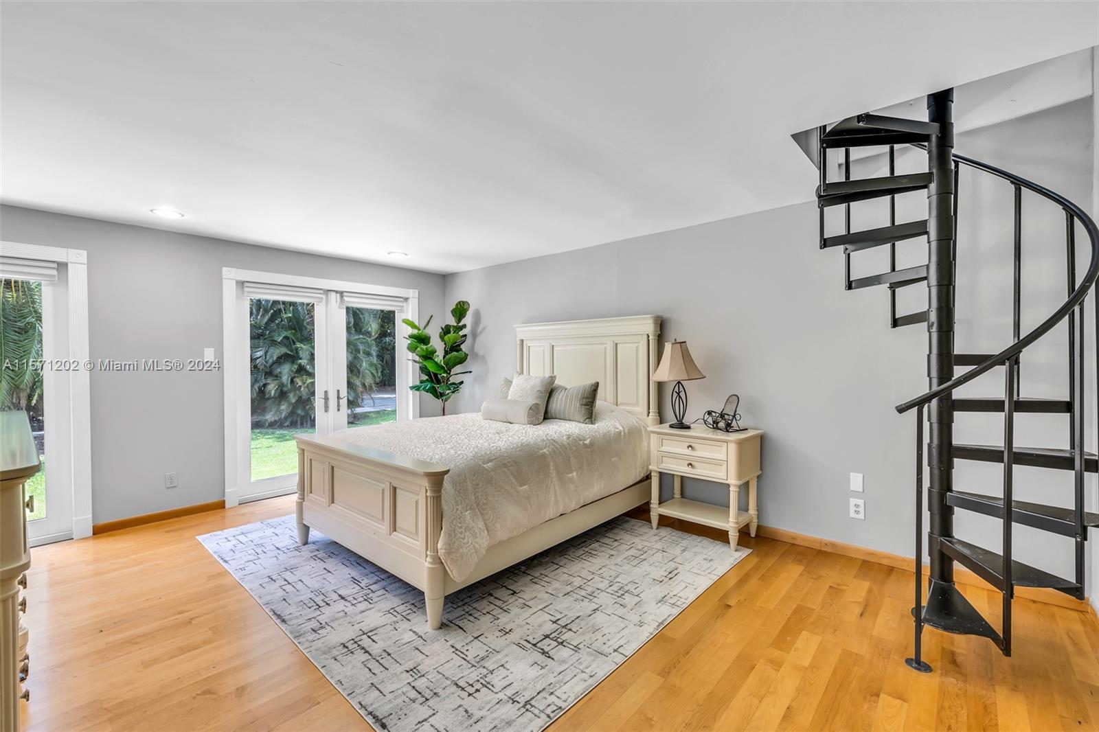 14600 Marvin Lane Southwest Ranches, FL 33330 - Photo 47 of 72 a living room with a bed furniture and a window
