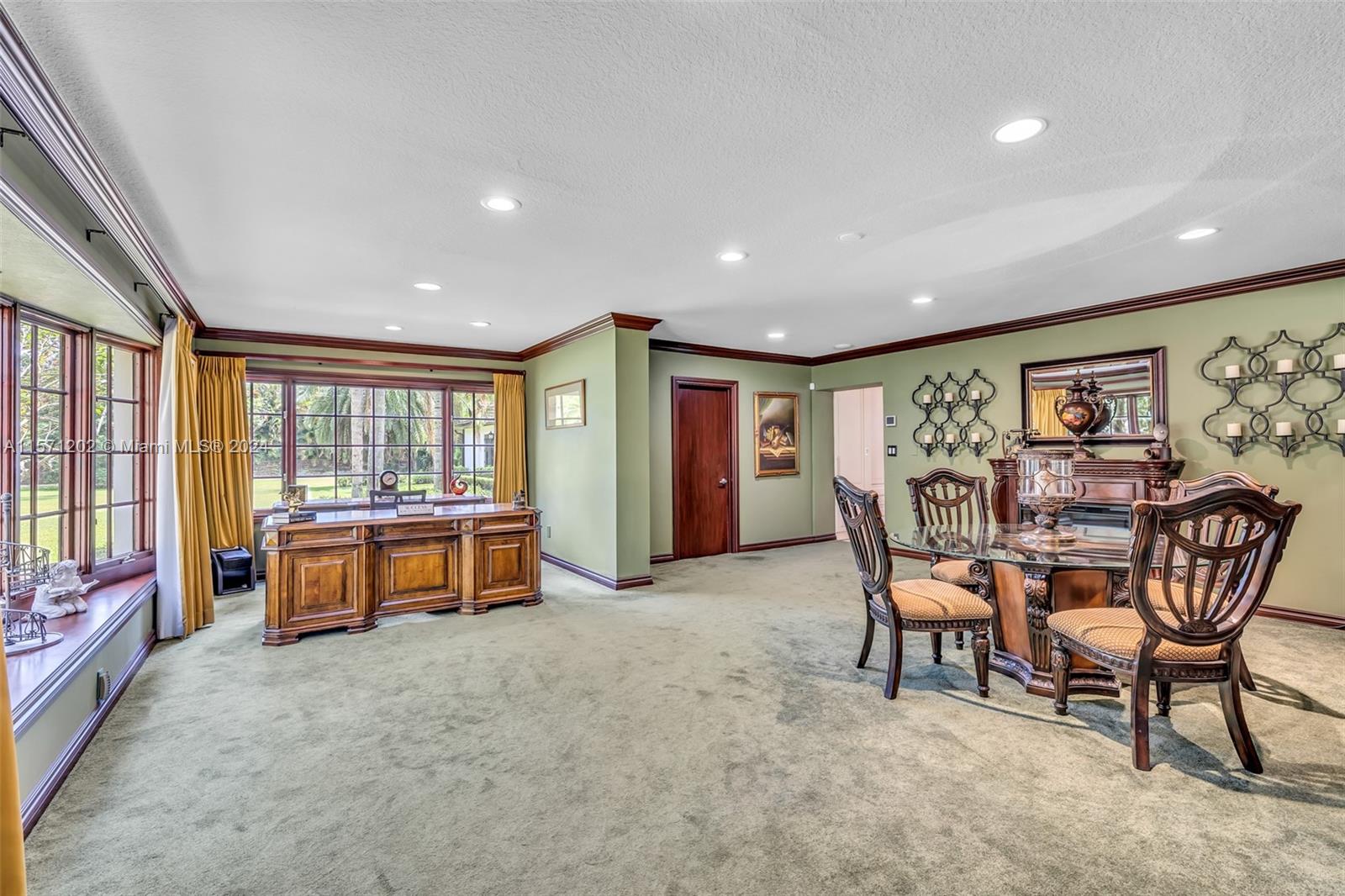 14600 Marvin Lane Southwest Ranches, FL 33330 - Photo 54 of 72 a living room with furniture and a large window