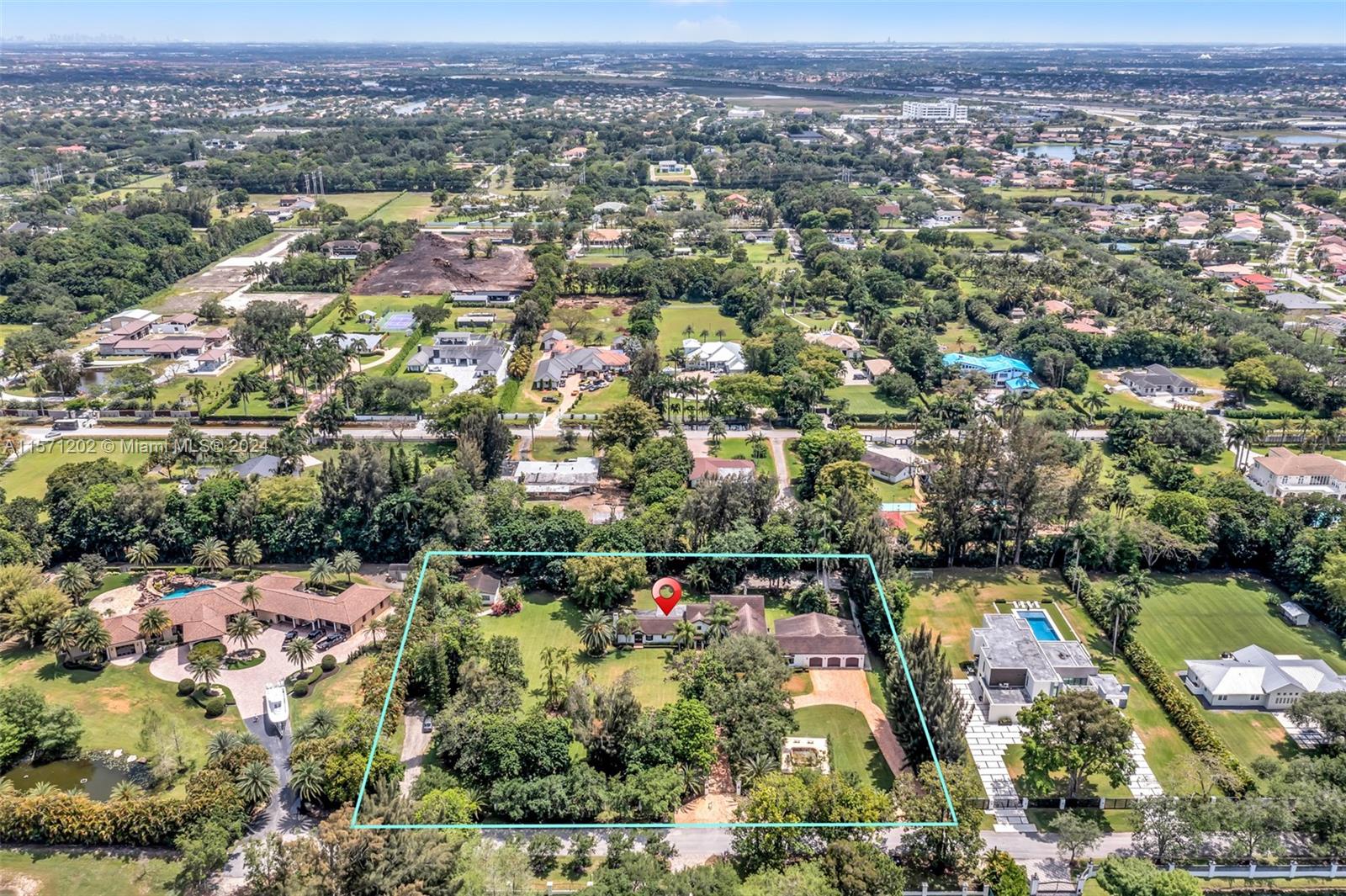 14600 Marvin Lane Southwest Ranches, FL 33330 - Photo 62 of 72 an aerial view of residential houses with outdoor space and trees