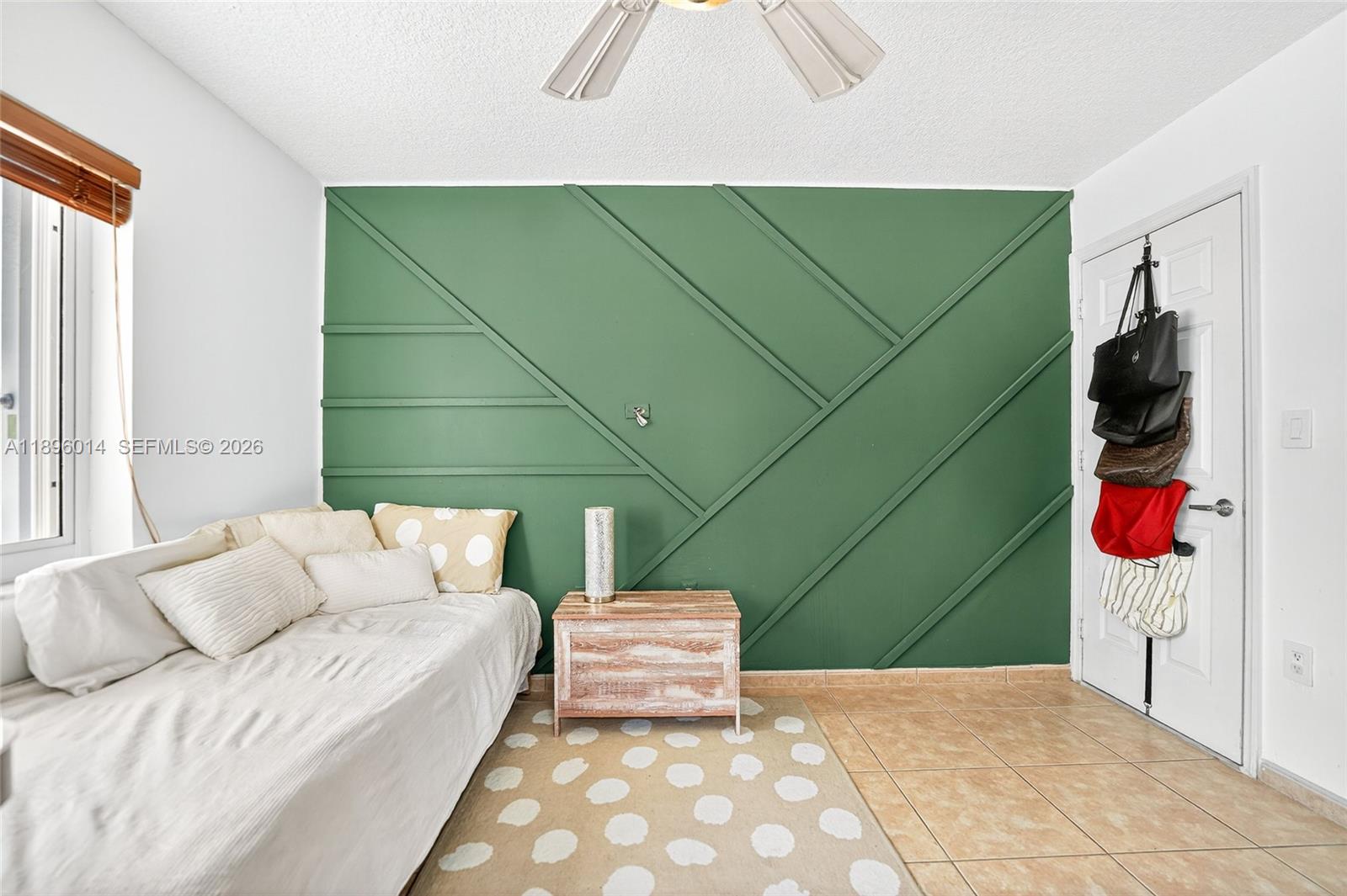 752 Northwest 134th Avenue Miami, FL 33182 - Photo 25 of 47 a bedroom with a bed and cabinets