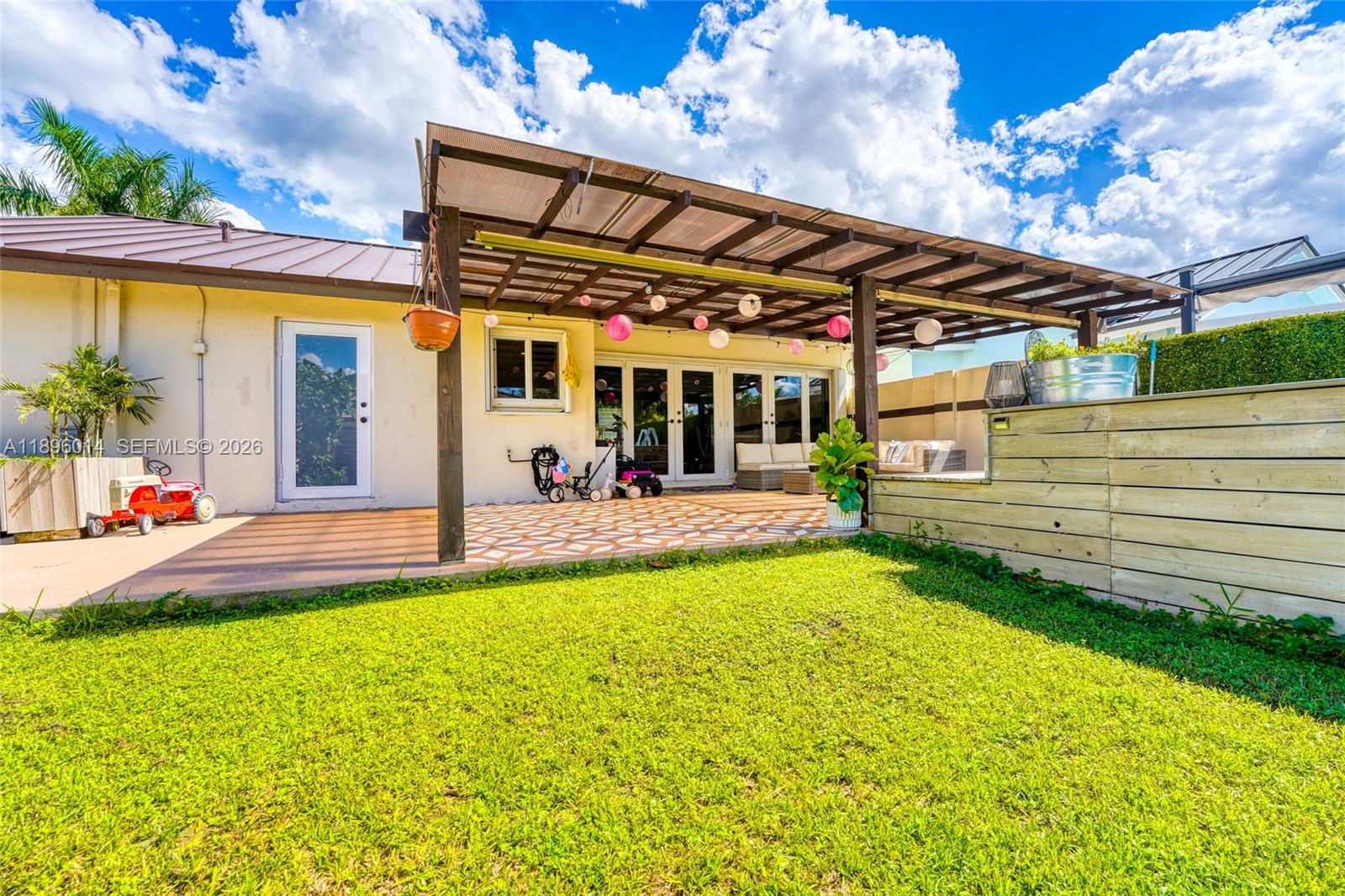 752 Northwest 134th Avenue Miami, FL 33182 - Photo 35 of 47 a view of a house with swimming pool and sitting area