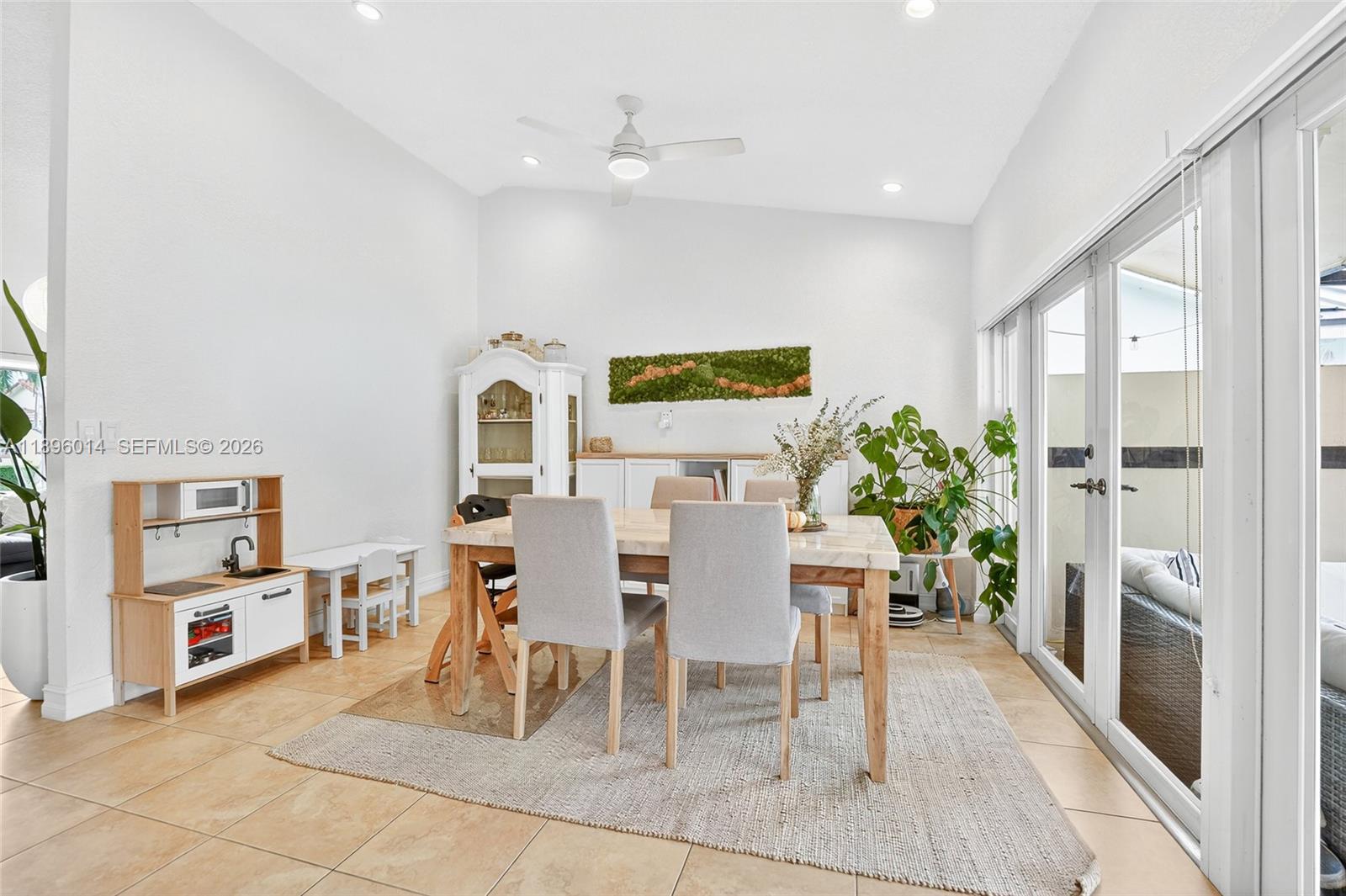 752 Northwest 134th Avenue Miami, FL 33182 - Photo 4 of 47 a view of a dining room with furniture