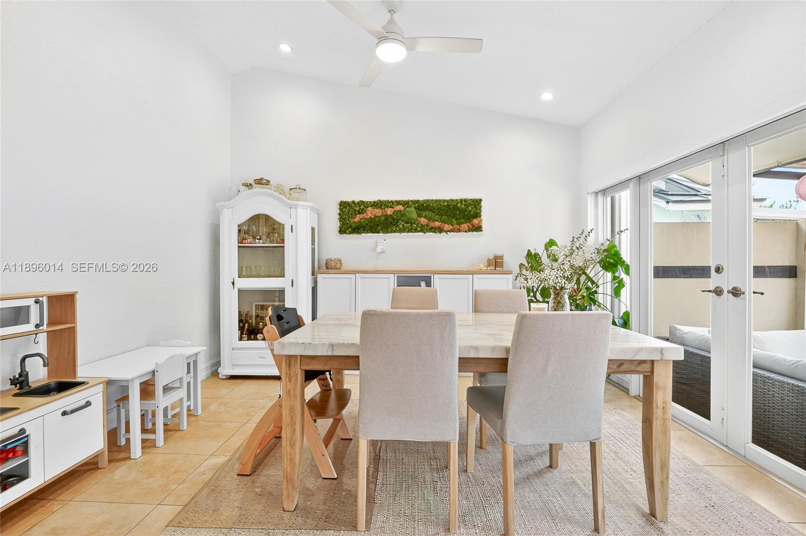 752 Northwest 134th Avenue Miami, FL 33182 - Photo 7 of 47 a view of a dining room with furniture and wooden floor