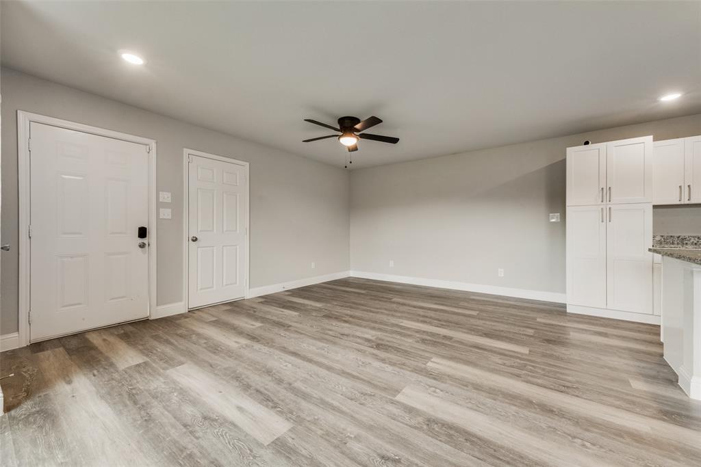 3153 Stag Road Dallas, TX 75241 - Photo 3 of 15 a view of an empty room with a ceiling fan