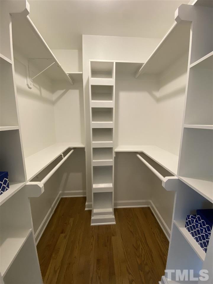 917 Deerfield Road Raleigh, NC 27609 - Photo 12 of 20 a view of walk in closet with empty racks