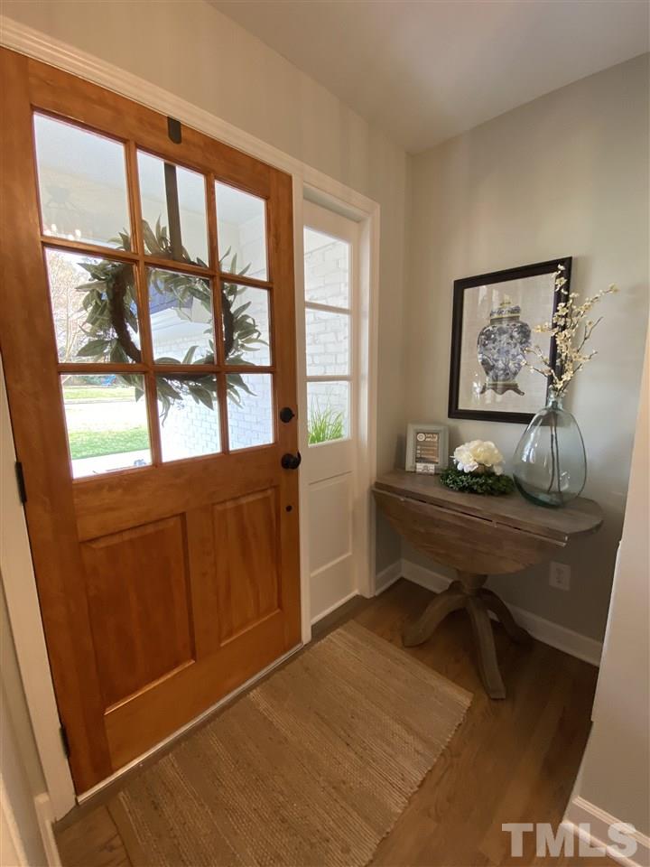 917 Deerfield Road Raleigh, NC 27609 - Photo 17 of 20 a living room with furniture and a window