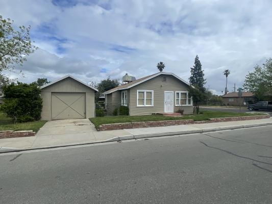 15300 West E Street Kerman, CA 93630 - Photo 1 of 13 a house with a outdoor space