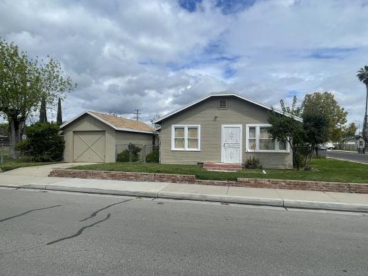 15300 West E Street Kerman, CA 93630 - Photo 2 of 13 a house with trees in the background