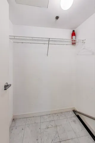 a view of a building with sitting area