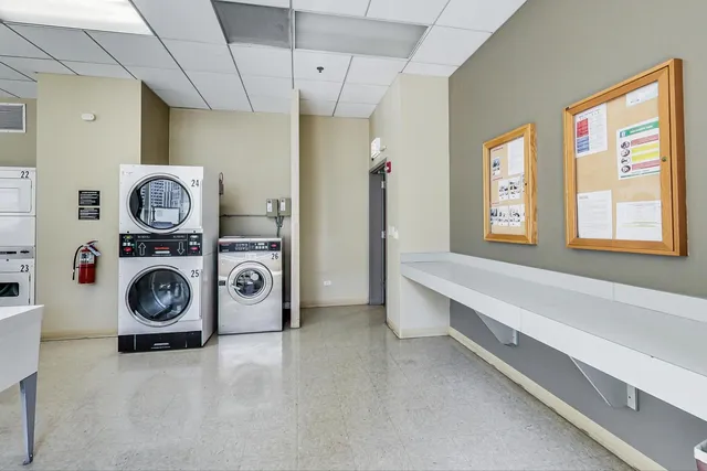 a view of a patio with tables and chairs and potted plants