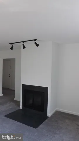 a living room with a fireplace