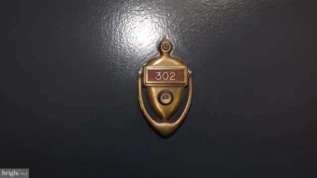 a close up of a sink with a sign of board