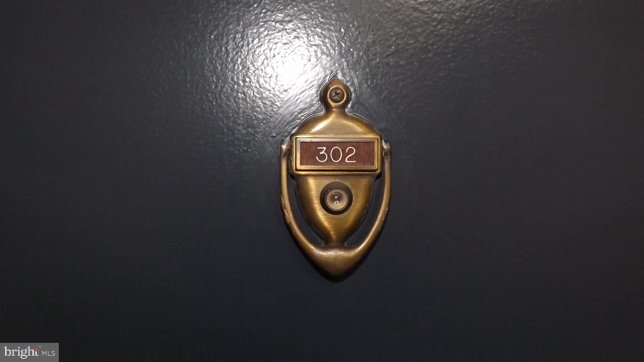 2206 Washington Avenue, Unit 302 Silver Spring, MD 20910 - Photo 20 of 26 a close up of a sink with a sign of board